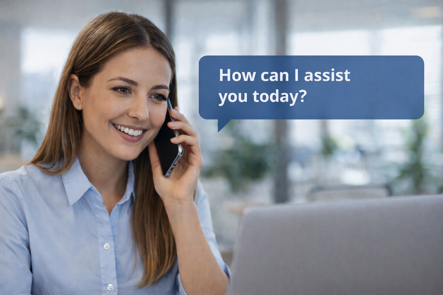 A woman smiling while talking on the phone, offering assistance.